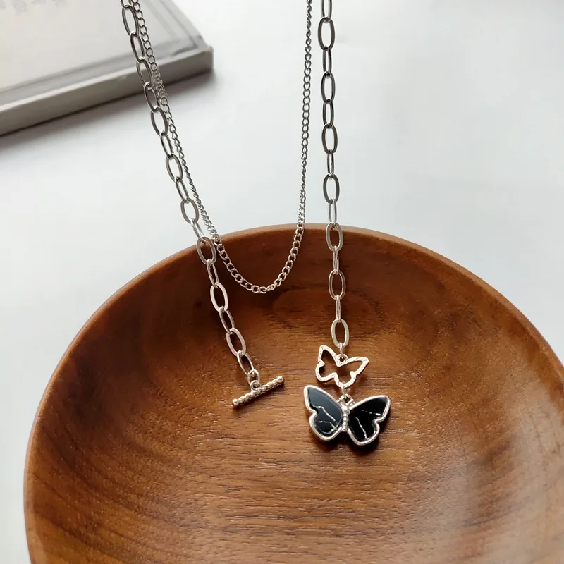 Fashion Temperament Butterfly Pendant Necklace Creative Design Word Buckle Necklace Double Layered Clavicle Chain Wholesale
Fashion Temperament Butterfly Pendant Necklace Creative Design Word Buckle Necklace Double Layered Clavicle Chain Wholesale