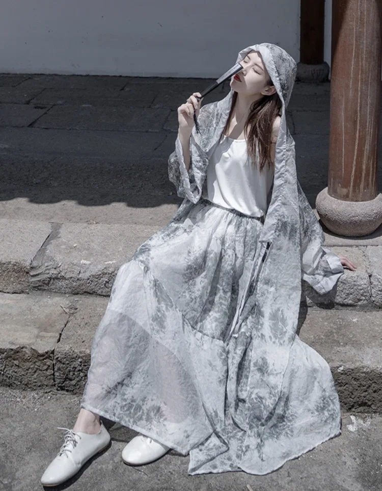 Cardigan skirt Tencel printed hooded lace-up sunscreen outer skirt 2 colors woman dress
Cardigan skirt Tencel printed hooded lace-up sunscreen outer skirt 2 colors woman dress