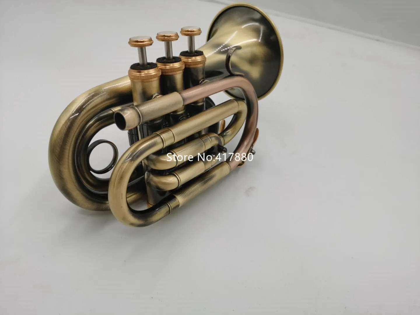 Popular Mini Pocket Trumpet Bb Flat Brass Material Antique copper Wind Instrument With Mouthpiece Gloves Carrying Case
Popular Mini Pocket Trumpet Bb Flat Brass Material Antique copper Wind Instrument With Mouthpiece Gloves Carrying Case