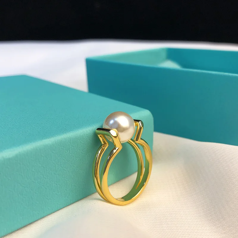 Original 1:1 LOGO TIF Horseshoe Joint U-shaped Pearl Ring Popular High Quality Luxury Jewelry Fashion Brand Women Free Shipping
Original 1:1 LOGO TIF Horseshoe Joint U-shaped Pearl Ring Popular High Quality Luxury Jewelry Fashion Brand Women Free Shipping