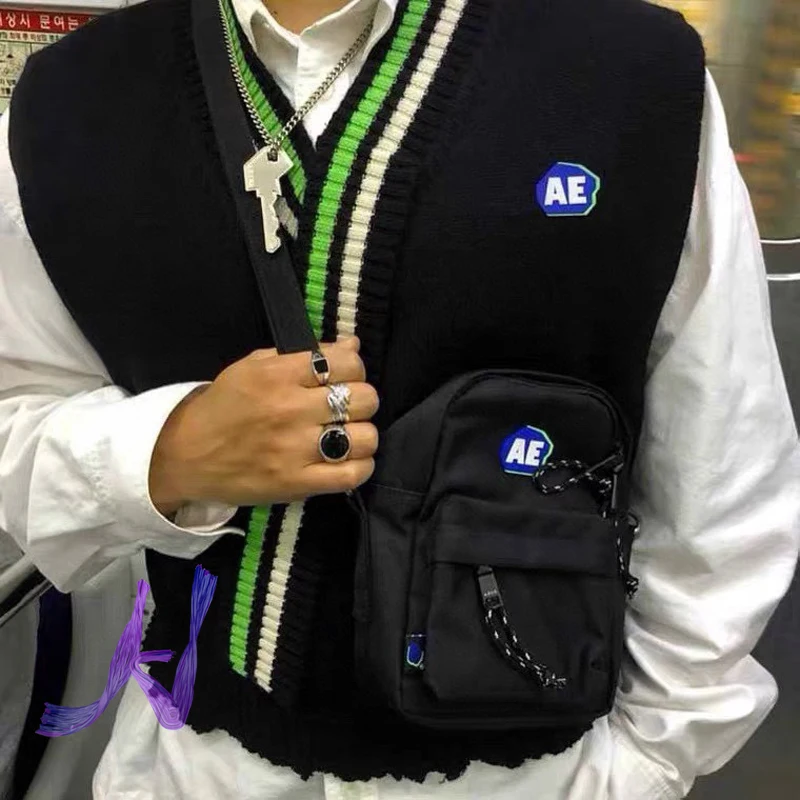 Жилет ADER EROR с V-образным вырезом, свитер без рукавов, Трикотажный жилет для мужчин и женщин в студенческом стиле
Жилет ADER EROR с V-образным вырезом, свитер без рукавов, Трикотажный жилет для мужчин и женщин в студенческом стиле