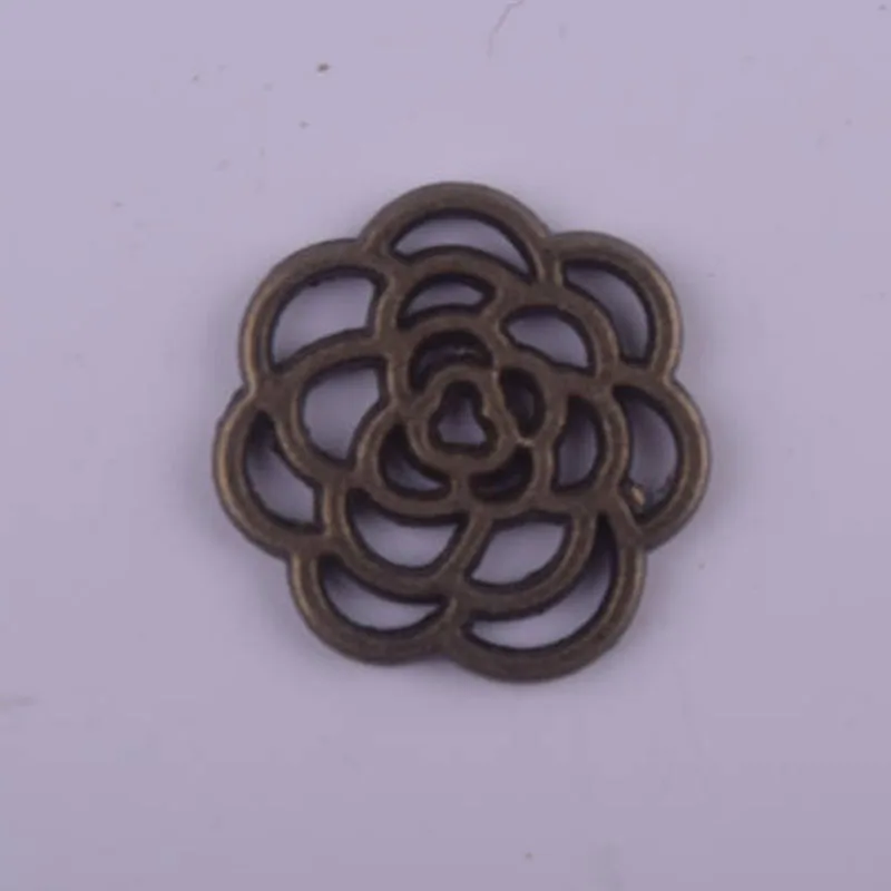 50pcs/lot Vintage Bronze Howout Rose Flower Shaped Charms Pendants for Jewelry Making DIY Handmade
50pcs/lot Vintage Bronze Howout Rose Flower Shaped Charms Pendants for Jewelry Making DIY Handmade