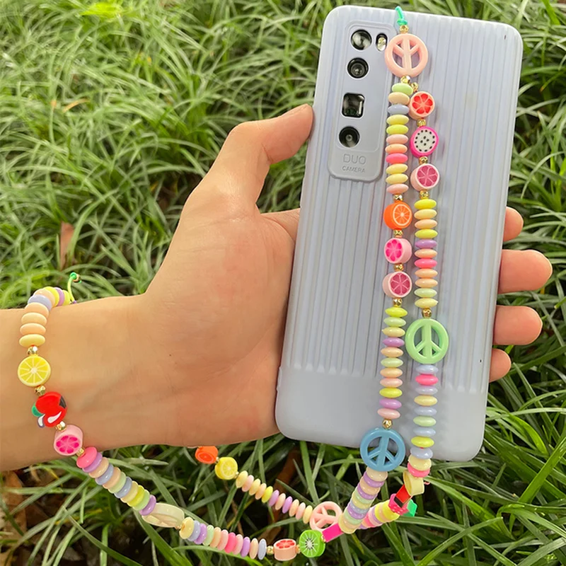 2021 New Long Phone Chain Colorful Bead Soft Pottery Acrylic Smiley Fruit Love Tassel Pendant Women Unisex Fashion Jewelry
2021 New Long Phone Chain Colorful Bead Soft Pottery Acrylic Smiley Fruit Love Tassel Pendant Women Unisex Fashion Jewelry