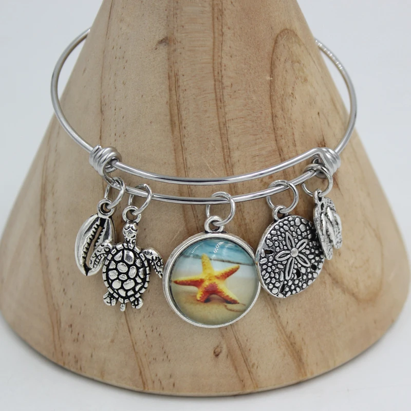 Stainless Steel Bangle Bracelet Beach Bangle Ocean Cowrie Starfish Flip Flop Charm Bracelets gifts for women jewelry pulsera
Stainless Steel Bangle Bracelet Beach Bangle Ocean Cowrie Starfish Flip Flop Charm Bracelets gifts for women jewelry pulsera