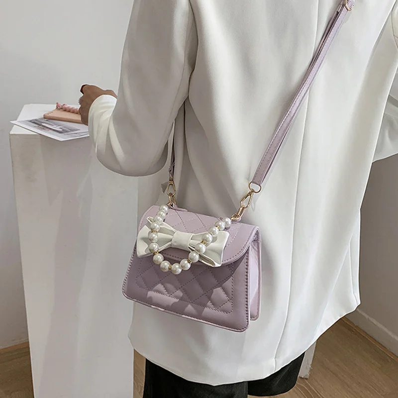 Summer bow mini bag woman's hand-held Pearl Bag 2021 new style fashionable one-shoulder cross-body small square bag
Summer bow mini bag woman's hand-held Pearl Bag 2021 new style fashionable one-shoulder cross-body small square bag