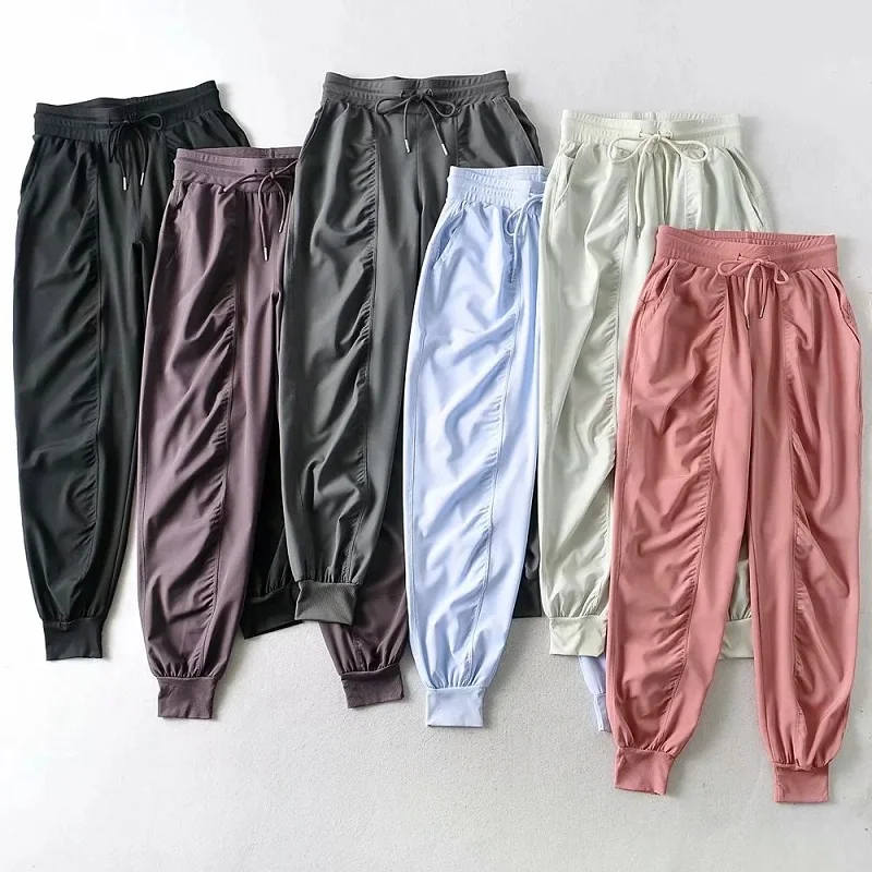 Yoga fitness sports trousers loose guard pants trendy women's 2021 summer new elastic waist tie folds casual pure pocket fashion
Yoga fitness sports trousers loose guard pants trendy women's 2021 summer new elastic waist tie folds casual pure pocket fashion