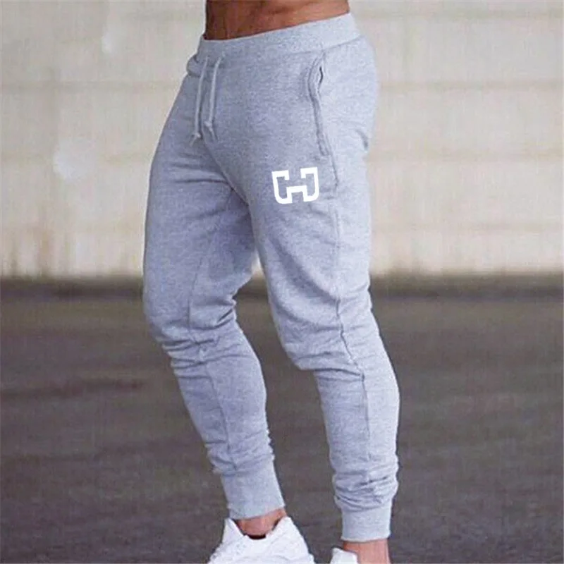 Men Cotton Sweatpants Gym Joggers Pants Man Gyms Fitness Bodybuilding Workout Trousers Street Men Pencil Pants
Men Cotton Sweatpants Gym Joggers Pants Man Gyms Fitness Bodybuilding Workout Trousers Street Men Pencil Pants