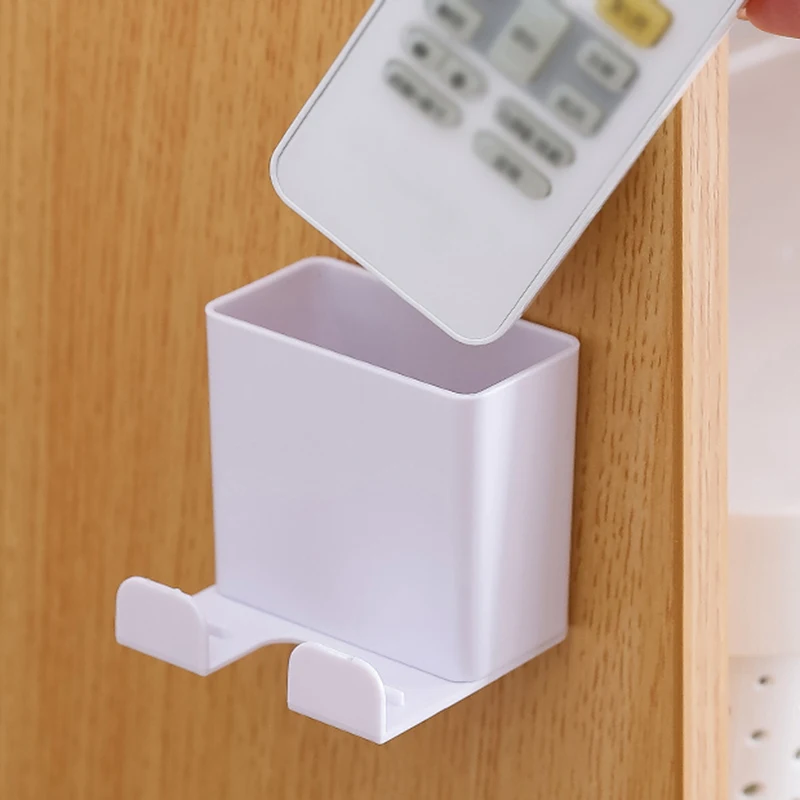 Wall Mounted Remote Control Holder Storage Case Mobile Phone Plug Storage Rack Holder Stand Remote Control Base Support Hook
Wall Mounted Remote Control Holder Storage Case Mobile Phone Plug Storage Rack Holder Stand Remote Control Base Support Hook