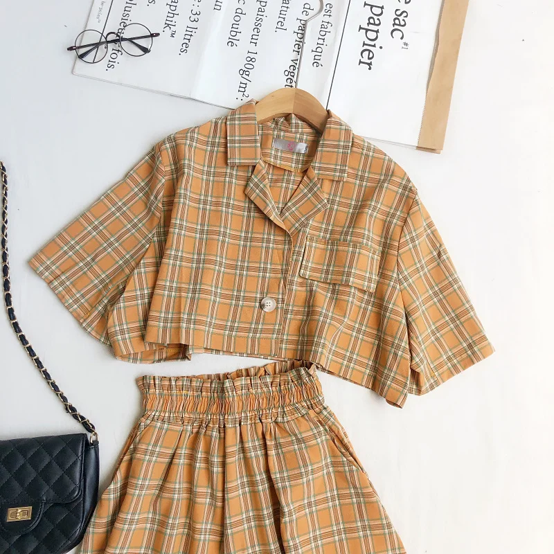 Summer new sweet and versatile plaid suit collar bat sleeve short shirt + elastic high waist wide leg pants suit
Summer new sweet and versatile plaid suit collar bat sleeve short shirt + elastic high waist wide leg pants suit