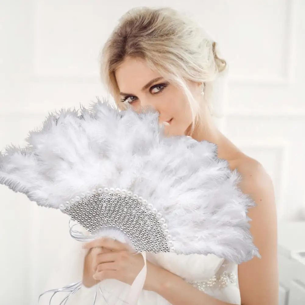Light Wedding Feather Fan Bride Handheld Feathers and Pearls Non-Folding Fans Wedding Photo Shooting Performance Decoration Prop
Light Wedding Feather Fan Bride Handheld Feathers and Pearls Non-Folding Fans Wedding Photo Shooting Performance Decoration Prop