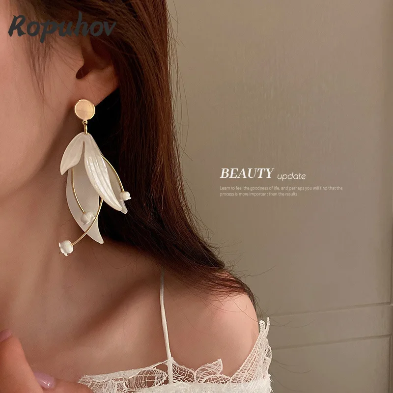 Серьги Ropuhov из серебра 925 пробы с лепестками цветка 
Серьги Ropuhov из серебра 925 пробы с лепестками цветка