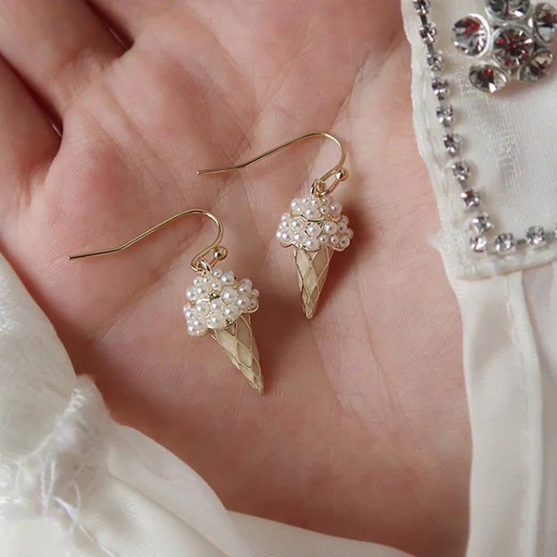 Korea East Gate Fashion Design Sense Pearl Ice Cream Earrings Simple Personality Ear Hook Net Red Temperament Earrings Women 
Korea East Gate Fashion Design Sense Pearl Ice Cream Earrings Simple Personality Ear Hook Net Red Temperament Earrings Women