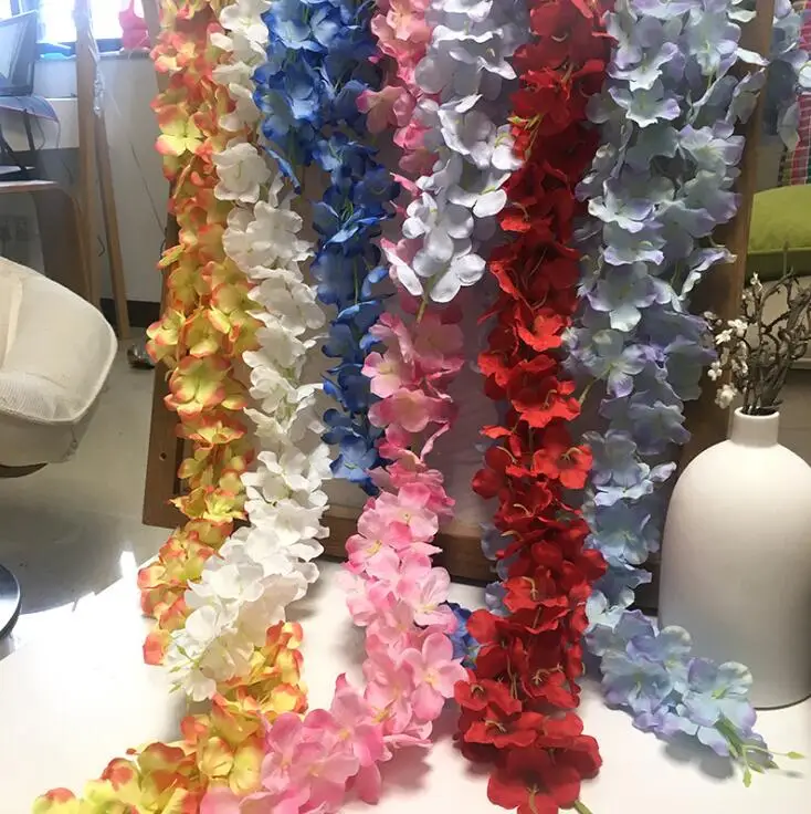 100pcs/lot 24 Colors Artificial Silk Flower Wisteria Flower Vine Home Garden Wall Hanging Rattan DIY Party Wedding Decoration
100pcs/lot 24 Colors Artificial Silk Flower Wisteria Flower Vine Home Garden Wall Hanging Rattan DIY Party Wedding Decoration
