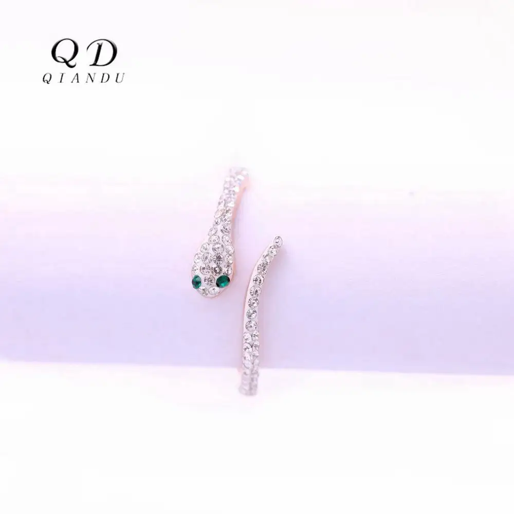 Qian Du stainless steel rose gold lady ring with transparent crystal snake shape opening ring lady personality jewelry
Qian Du stainless steel rose gold lady ring with transparent crystal snake shape opening ring lady personality jewelry