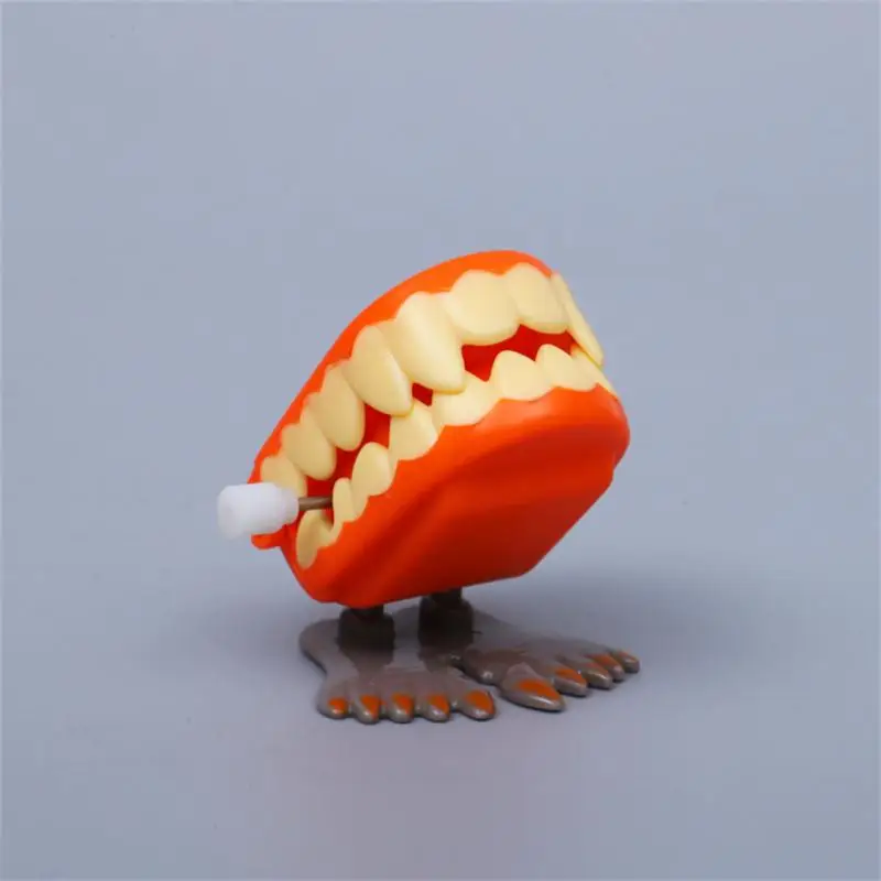 1pcs Clockwork Toy Upper Chain Jumping Tooth Toy Children Jump Teeth Running Clockwork Spring Wind Up Toy Halloween Toys Gift
1pcs Clockwork Toy Upper Chain Jumping Tooth Toy Children Jump Teeth Running Clockwork Spring Wind Up Toy Halloween Toys Gift