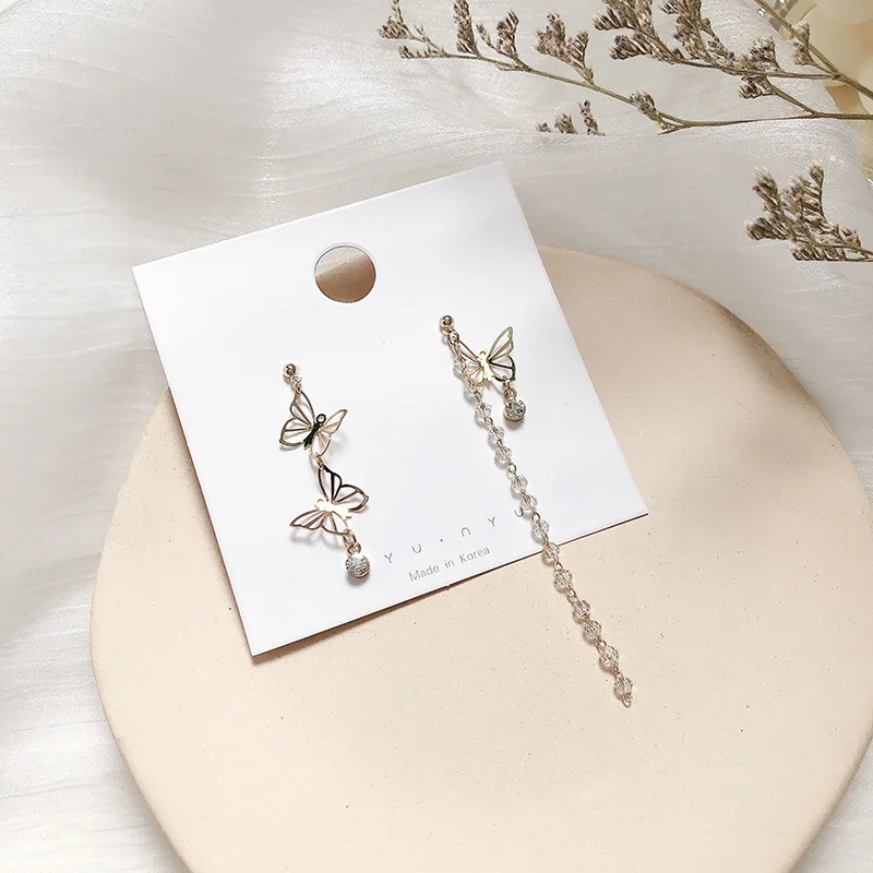 Korean new advanced asymmetric hollowed out Butterfly Earrings cool temperament crystal Tassel Earrings net red personalized fas
Korean new advanced asymmetric hollowed out Butterfly Earrings cool temperament crystal Tassel Earrings net red personalized fas