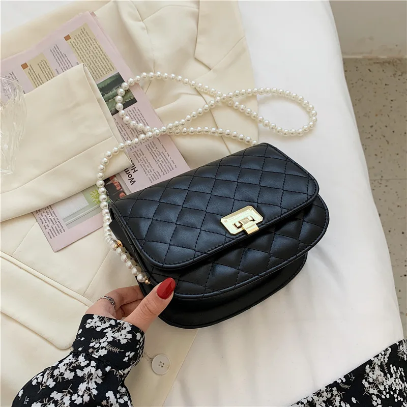 High Quality Korean Version of Sweet Ladies Pearl Chain Bag2021new Fashion One-shoulder Messenger Bag Net Red Rhombus Saddle Bag
High Quality Korean Version of Sweet Ladies Pearl Chain Bag2021new Fashion One-shoulder Messenger Bag Net Red Rhombus Saddle Bag