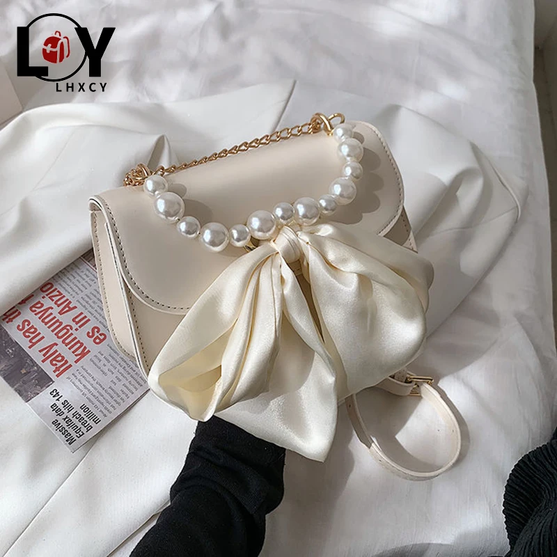 LHXCY High Quality Pearl Handle Chain Crossbody Bags Korean Style Clamshell Bow Purses And Handbags Fashion Luxury Shoulder Bags
LHXCY High Quality Pearl Handle Chain Crossbody Bags Korean Style Clamshell Bow Purses And Handbags Fashion Luxury Shoulder Bags
