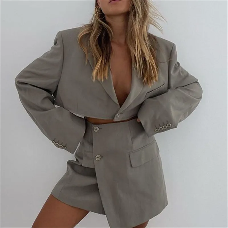 Sexy Notched Single Button Blazer Set Women 2021 Spring V-neck Long Sleeve Top Asymmetry Skirt Suit Office Ladies Outfit
Sexy Notched Single Button Blazer Set Women 2021 Spring V-neck Long Sleeve Top Asymmetry Skirt Suit Office Ladies Outfit