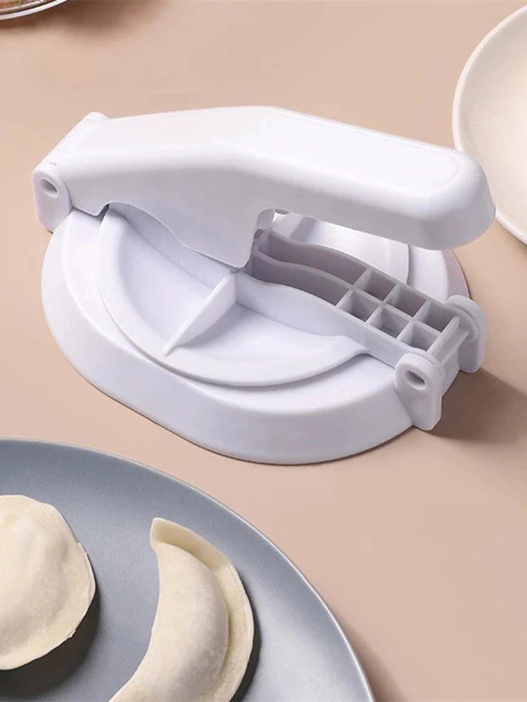 Creative Chinese Style Dumpling Skin Artifact Household Press Machine Kitchen Manual Skin Press Mold Dumpling Making Tool
Creative Chinese Style Dumpling Skin Artifact Household Press Machine Kitchen Manual Skin Press Mold Dumpling Making Tool