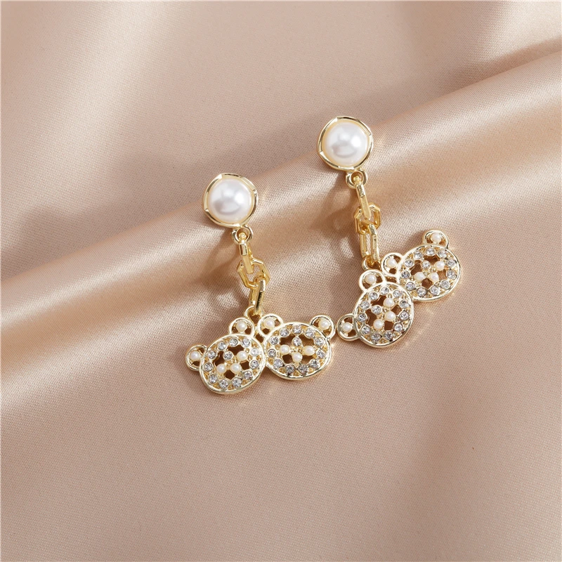 Cute Imitation Pearl Double Bear Drop Earrings for Women Fashion Female Stud Earrings Girls Party Clothes Jewelry Accessories
Cute Imitation Pearl Double Bear Drop Earrings for Women Fashion Female Stud Earrings Girls Party Clothes Jewelry Accessories