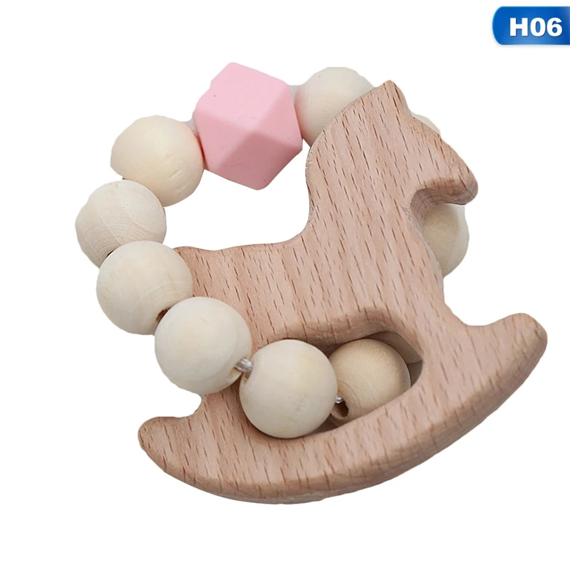 Newborn Baby Teething Bracelets Wooden Cute Cartoon Shape Teether Silicone Beads Rattles Toys Kids Boy Girl Shower Gifts
Newborn Baby Teething Bracelets Wooden Cute Cartoon Shape Teether Silicone Beads Rattles Toys Kids Boy Girl Shower Gifts
