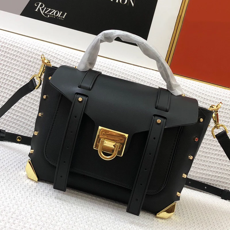 Retro heavy industry rivets large-capacity leather handbags ladies new fashion diagonal shoulder bags star same style 
Retro heavy industry rivets large-capacity leather handbags ladies new fashion diagonal shoulder bags star same style
