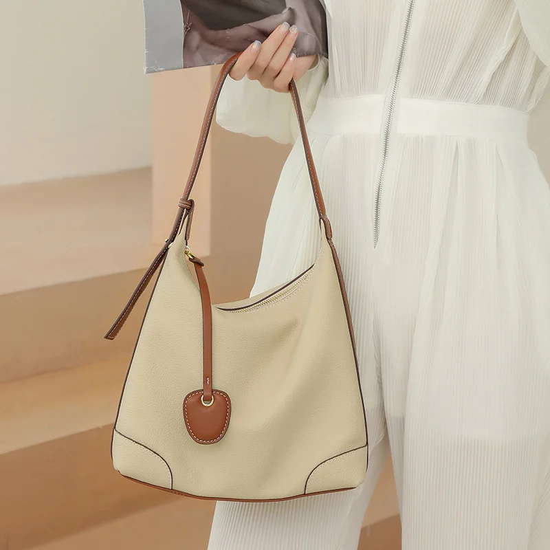 women's niche design Togo top Leather tote 2021 new fashion versatile One Shoulder Messenger bag
women's niche design Togo top Leather tote 2021 new fashion versatile One Shoulder Messenger bag
