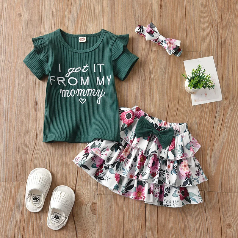 3Pcs Baby Girls Clothes Summer Set Ribbed Letter Print Fly Sleeve Round Neck T-shirt Floral Tiered Skirt with Bowknot Headband
3Pcs Baby Girls Clothes Summer Set Ribbed Letter Print Fly Sleeve Round Neck T-shirt Floral Tiered Skirt with Bowknot Headband