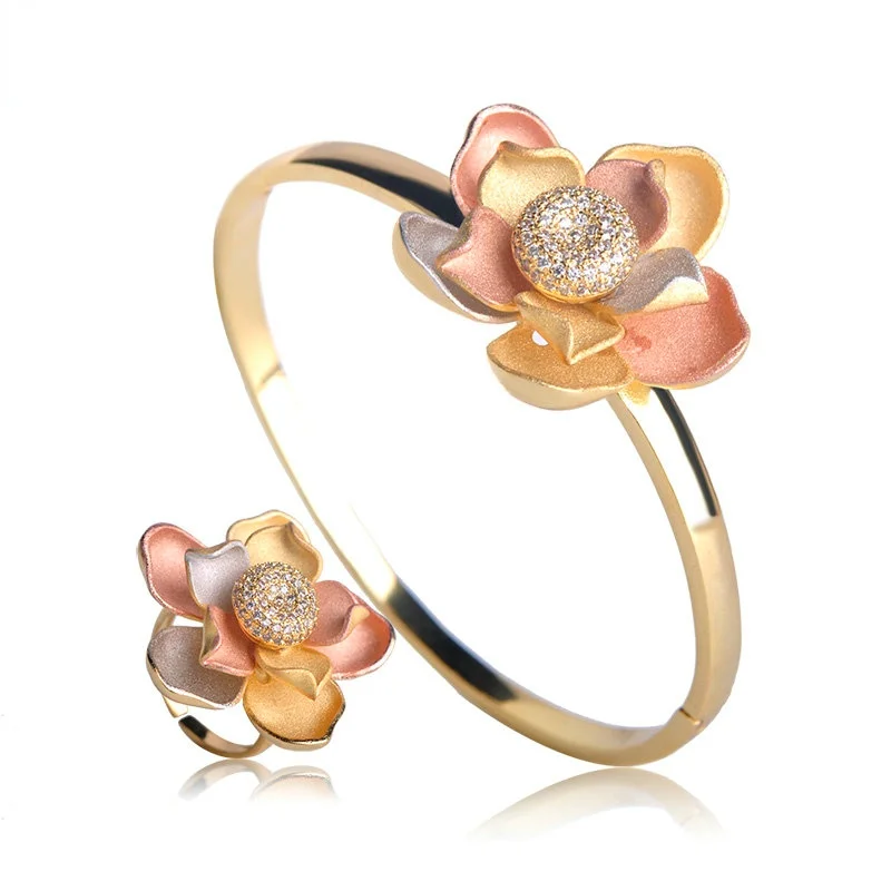 Blucome Three Tones Color Lotus Flowers Shape Bangle Ring Set Matt Sprayed Sand Jewelry Set For Women Ceremony Party Accessories
Blucome Three Tones Color Lotus Flowers Shape Bangle Ring Set Matt Sprayed Sand Jewelry Set For Women Ceremony Party Accessories
