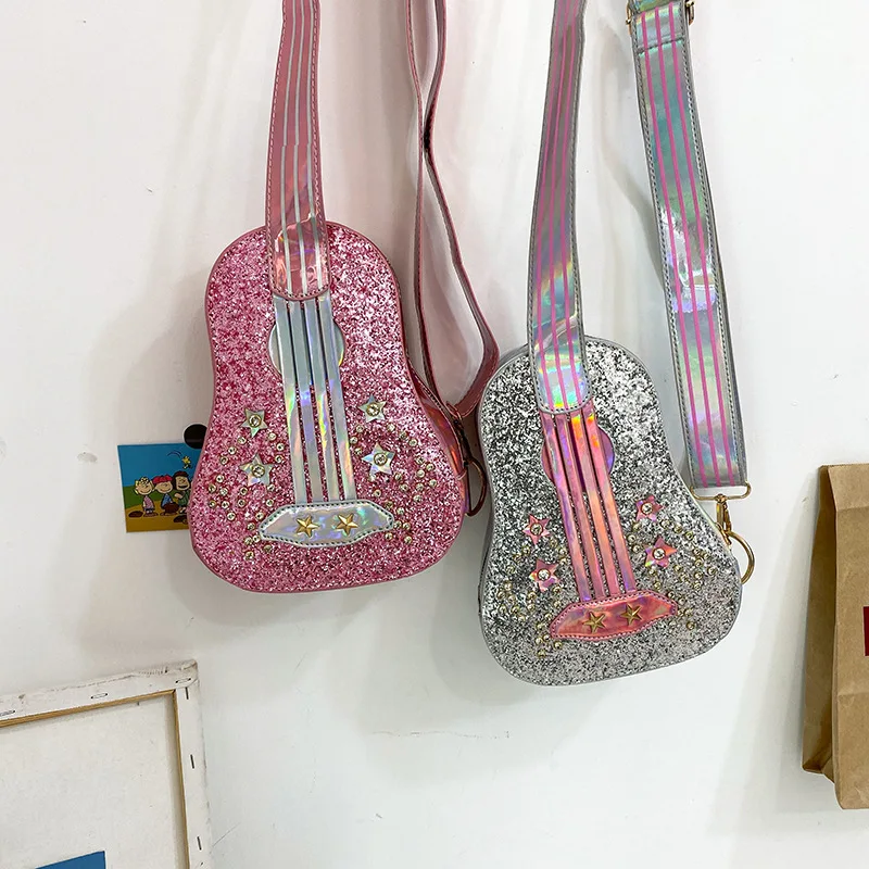 2020 Summer New Style Small Fresh Personality Laser Sequin Diamond Dream Violin Guitar Shape Small Shoulder Bag Female handbag
2020 Summer New Style Small Fresh Personality Laser Sequin Diamond Dream Violin Guitar Shape Small Shoulder Bag Female handbag