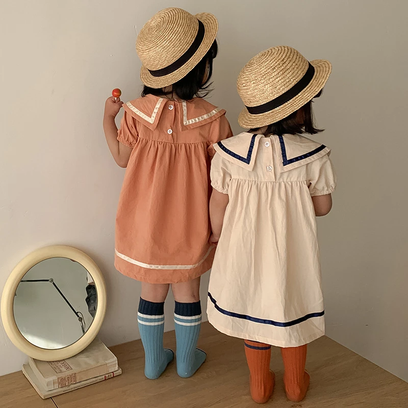 Summer style children's clothing college navy style girls dress lapel western style baby girl skirt short sleeves
Summer style children's clothing college navy style girls dress lapel western style baby girl skirt short sleeves