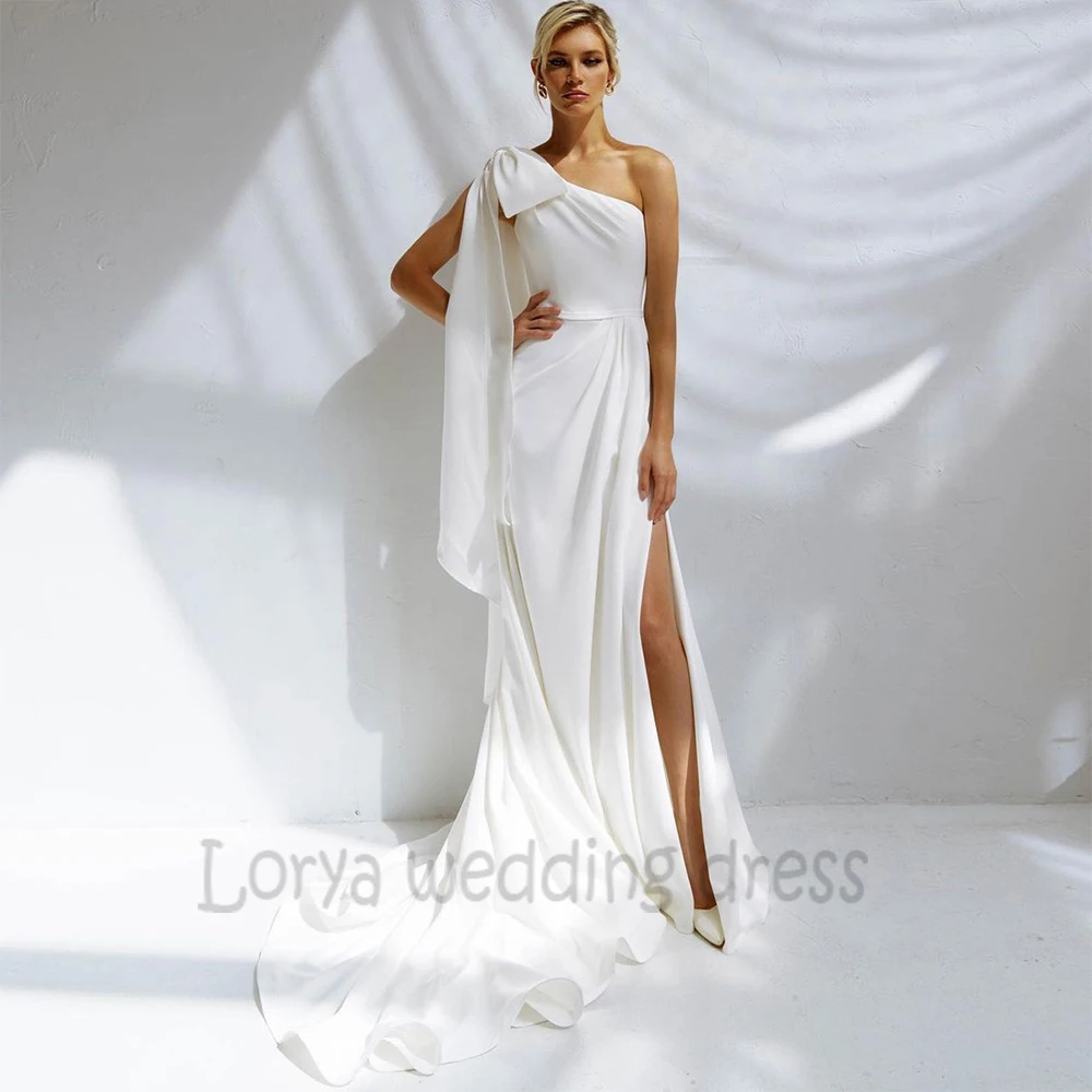 One Shoulder Wedding Dress Bow Cape Robe De Mariée Side Split Sweep Train Simple White Satin Bride Gown Vestidos De Novia
One Shoulder Wedding Dress Bow Cape Robe De Mariée Side Split Sweep Train Simple White Satin Bride Gown Vestidos De Novia