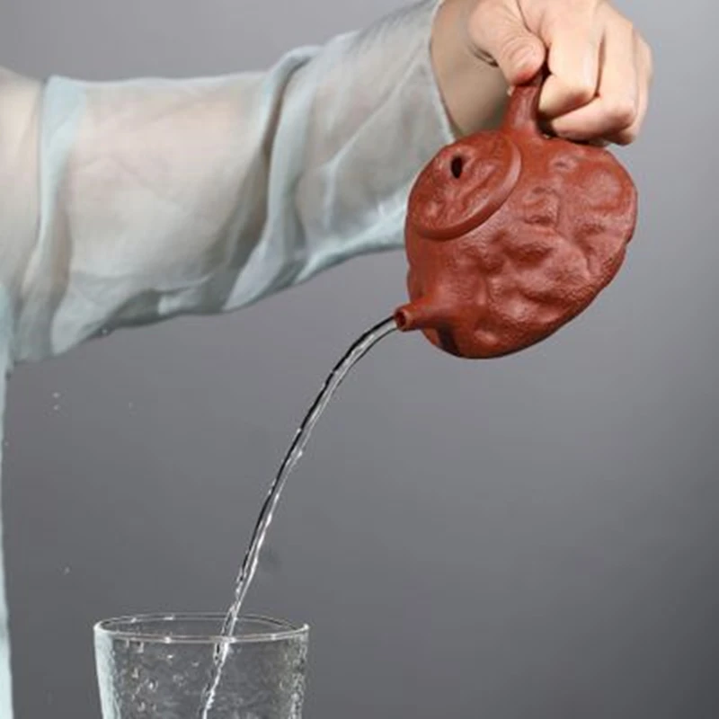 Yixing Purple Clay Teapot Handmade Raw Ore Dahongpao Spring Stone Scoop Pot Home 200 ML Tea Set Gifts
Yixing Purple Clay Teapot Handmade Raw Ore Dahongpao Spring Stone Scoop Pot Home 200 ML Tea Set Gifts