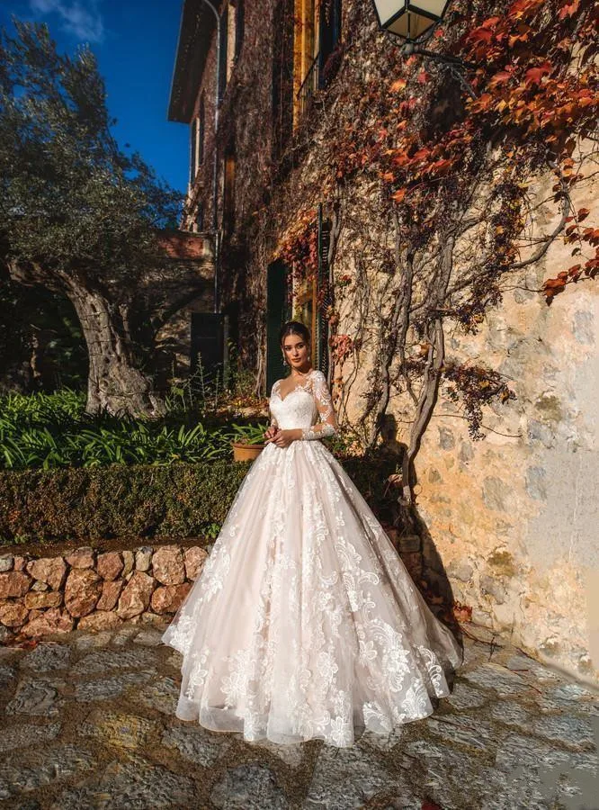 Elegant A-Line Wedding Dresses Lace jewel neck Long Illusion Sleeves Sweep Train Wedding Dress Bridal Gowns vestidos de novi
Elegant A-Line Wedding Dresses Lace jewel neck Long Illusion Sleeves Sweep Train Wedding Dress Bridal Gowns vestidos de novi