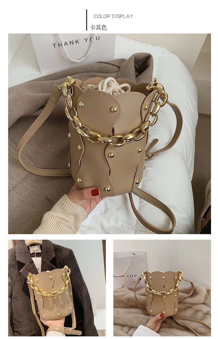 2021 Fashion Chain Tote Bucket bag New Quality PU Leather Women's Designer Handbag Rivet Shoulder Messenger Bag
2021 Fashion Chain Tote Bucket bag New Quality PU Leather Women's Designer Handbag Rivet Shoulder Messenger Bag