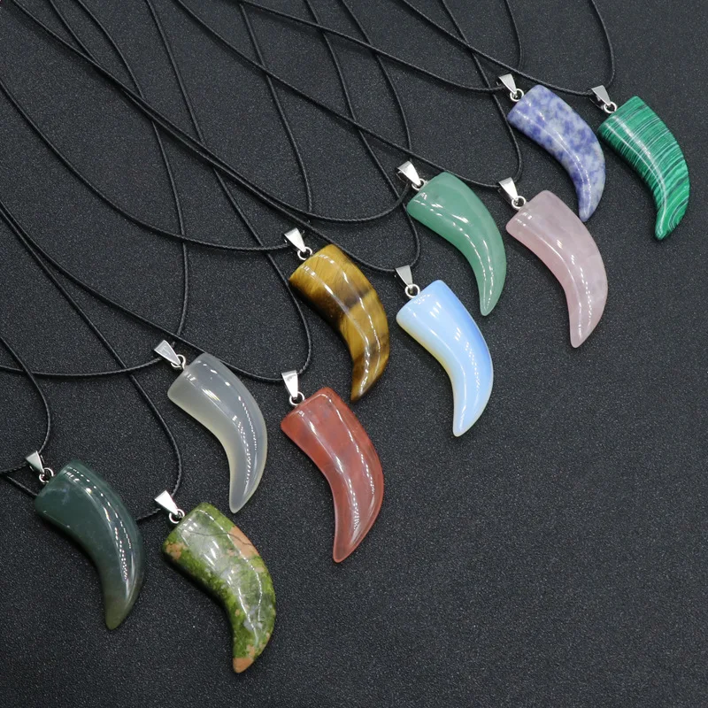 Hot selling agate crystal gem jewelry domineering men horn shape LANG tooth pendant pendant 1Pcs
Hot selling agate crystal gem jewelry domineering men horn shape LANG tooth pendant pendant 1Pcs