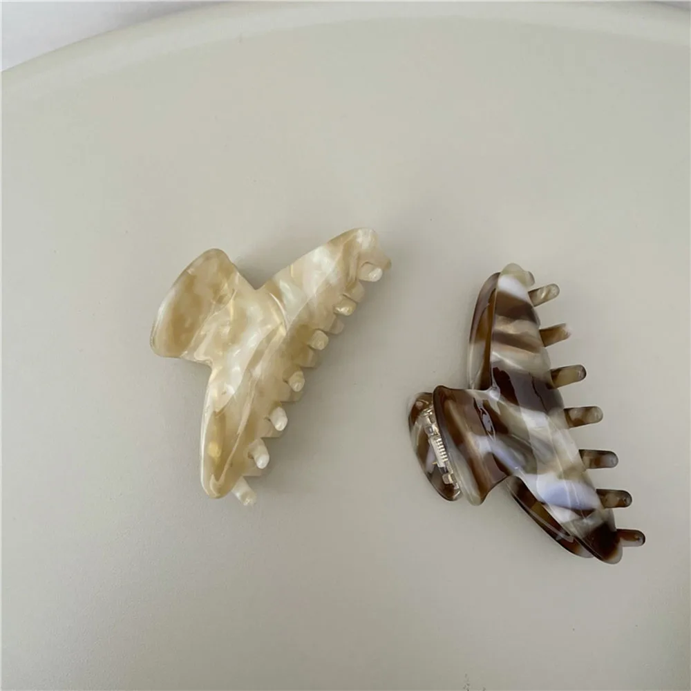 2021 New Women Elegant Marble Color Geometric Resin Hair Claw Vintage Hair Clips Headband Hairpin Fashion Hair Accessories Gifts
2021 New Women Elegant Marble Color Geometric Resin Hair Claw Vintage Hair Clips Headband Hairpin Fashion Hair Accessories Gifts