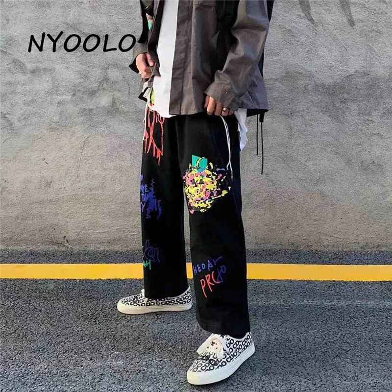 NYOOLO Vintage Streetwear Hip Hop Letters Graffiti Print Elastic Waist Straight Oversized Pants Women Men Casual Black Trousers
NYOOLO Vintage Streetwear Hip Hop Letters Graffiti Print Elastic Waist Straight Oversized Pants Women Men Casual Black Trousers