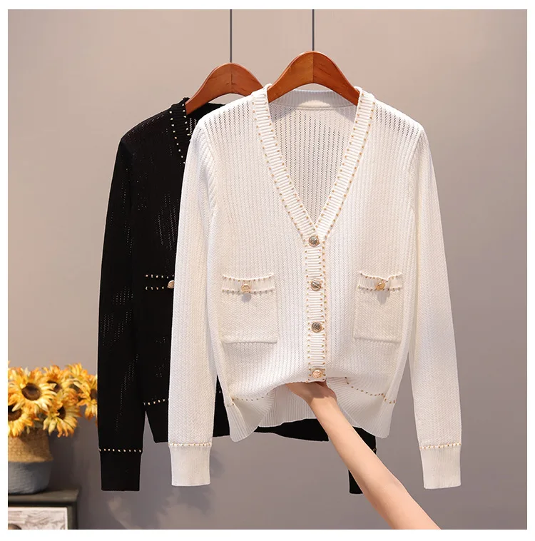 early autumn the new small sweet wind knitting cardigan loose hollow out gold line show thin coat a v-neck undertakes
early autumn the new small sweet wind knitting cardigan loose hollow out gold line show thin coat a v-neck undertakes