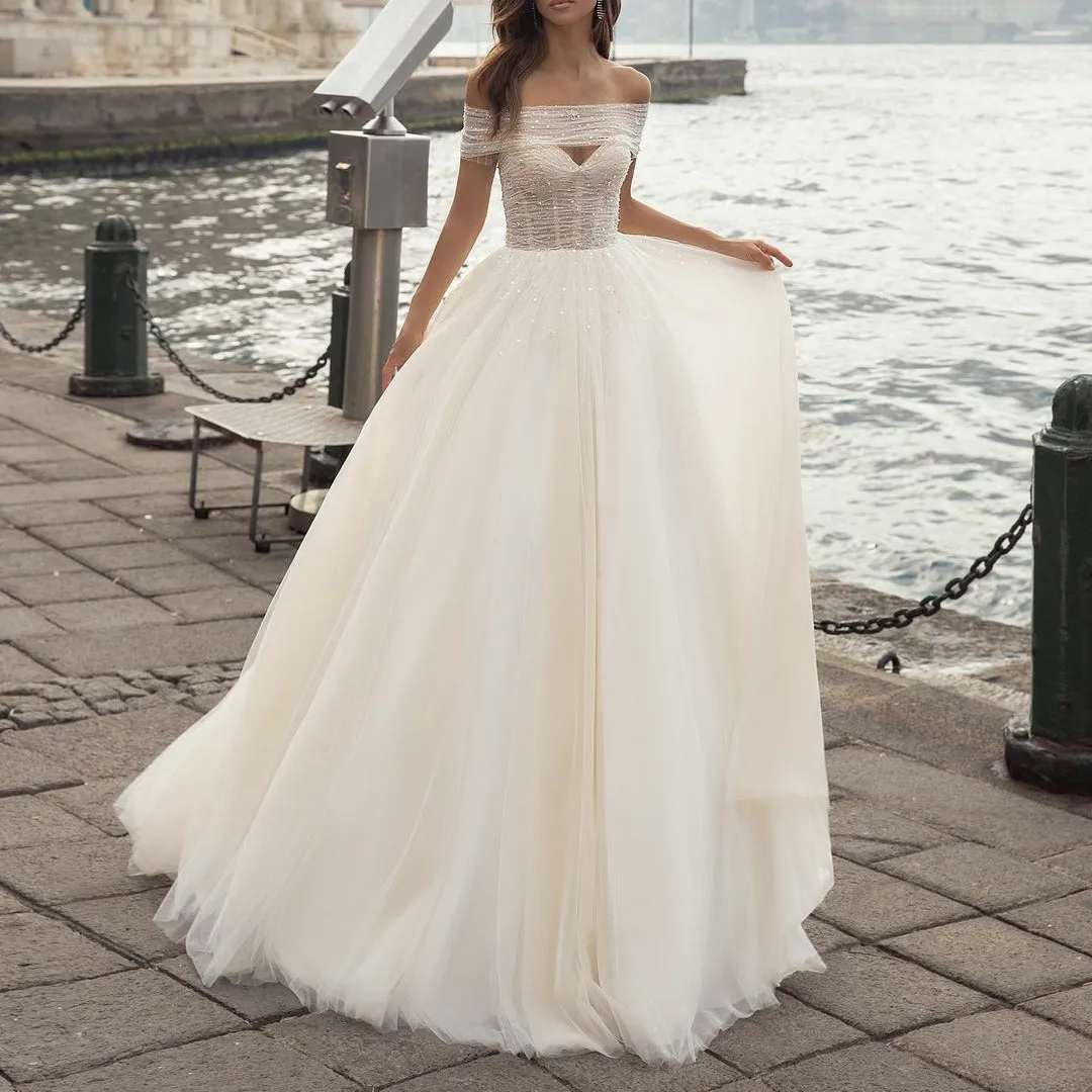 Vintage Long Tulle Sequin Wedding Dresses A-Line Tulle Lace Up Back Ivory Brautkleider Robes de Soirée for Women 
Vintage Long Tulle Sequin Wedding Dresses A-Line Tulle Lace Up Back Ivory Brautkleider Robes de Soirée for Women