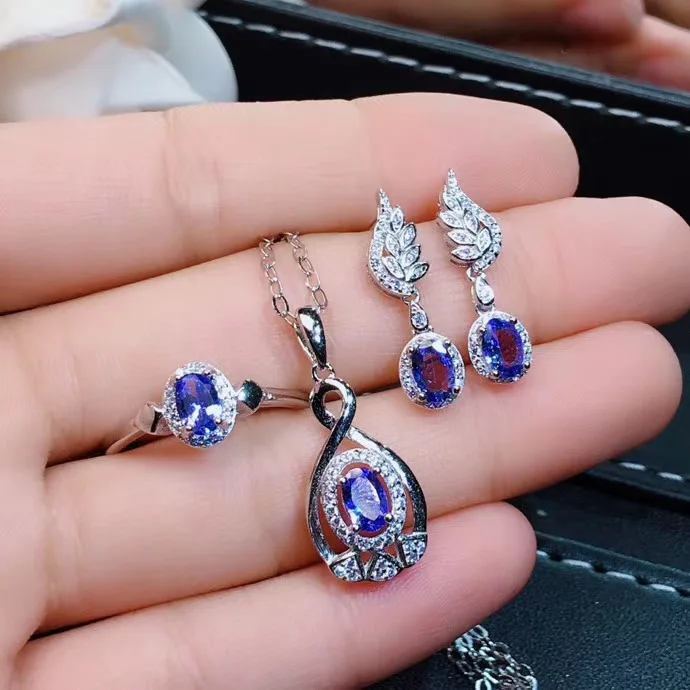 New Design Real Natural Tanzanite jewelry set Natural Real Tanzanite 925 sterling silver 1pc pendant,1pc ring,2pcs Earring 
New Design Real Natural Tanzanite jewelry set Natural Real Tanzanite 925 sterling silver 1pc pendant,1pc ring,2pcs Earring