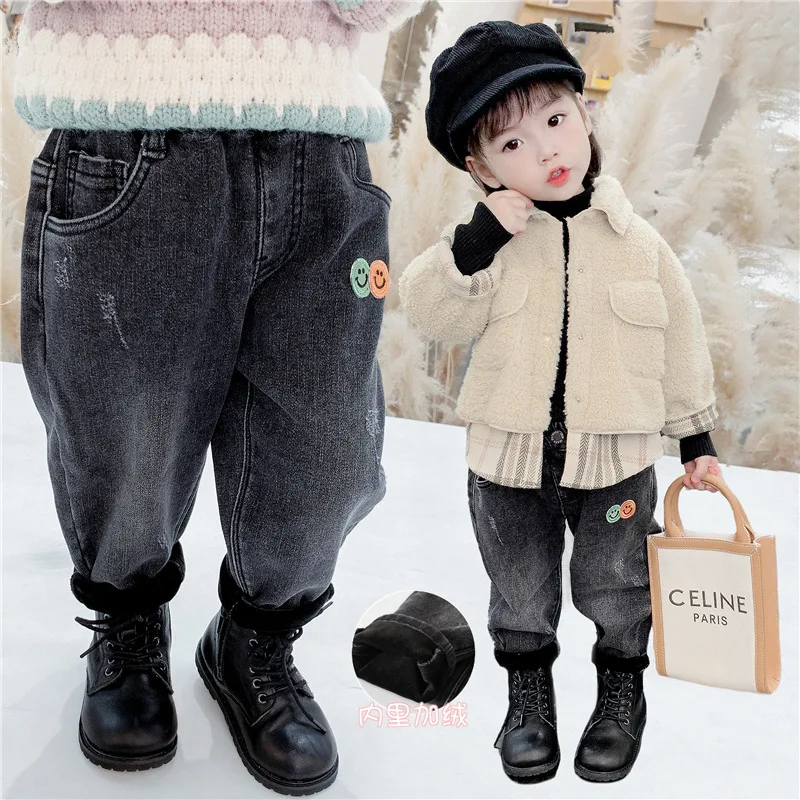 Children's clothing girls smiley face plus velvet jeans winter warm pants thickened children wear baby clothes outside in winter
Children's clothing girls smiley face plus velvet jeans winter warm pants thickened children wear baby clothes outside in winter