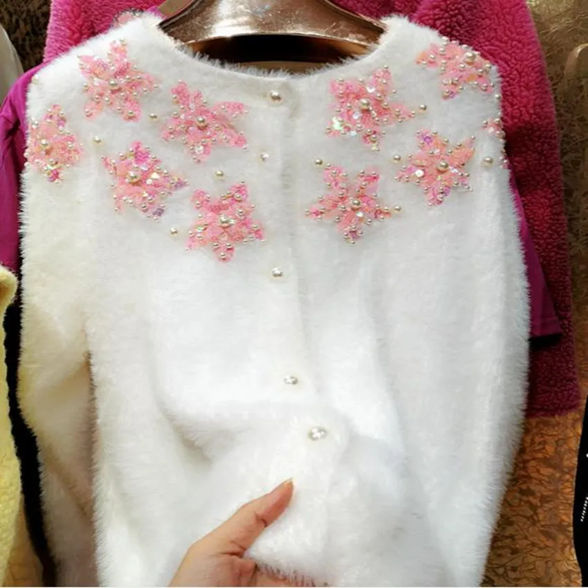 Gorgeous heavy industry cardigan women fashion pearl sequined flower beading princess loose sweater outwear
Gorgeous heavy industry cardigan women fashion pearl sequined flower beading princess loose sweater outwear