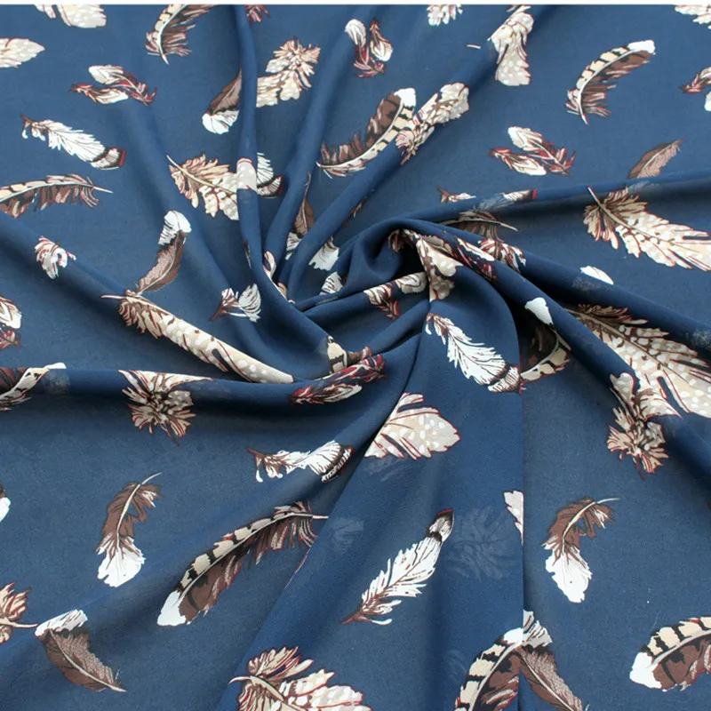 Half meter navy bottom with feather print chiffon fabric for dress skirt garment material T872
Half meter navy bottom with feather print chiffon fabric for dress skirt garment material T872