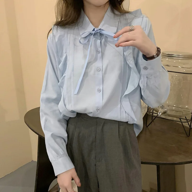 Blue Long Sleeve Shirt women's spring and autumn design sense niche shirt 2021 new French Ruffle chic top
Blue Long Sleeve Shirt women's spring and autumn design sense niche shirt 2021 new French Ruffle chic top