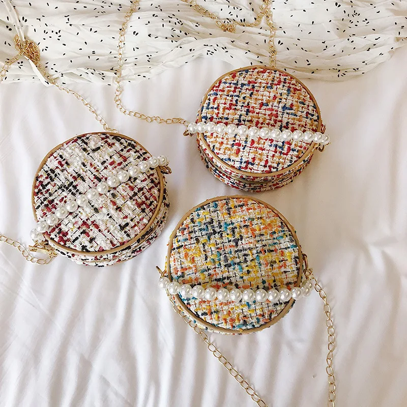 Small bag female 2021 new fairy pearl small round bag Korean version cute chain shoulder messenger bag
Small bag female 2021 new fairy pearl small round bag Korean version cute chain shoulder messenger bag