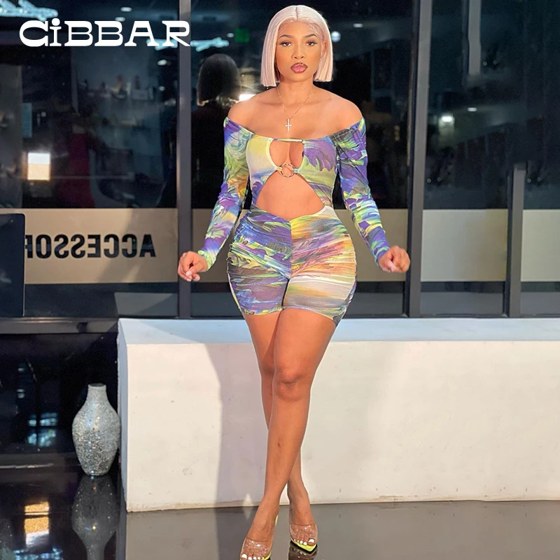 CIBBAR Hollow Out Bandage Backless Romper Women 2021 New Fashion Print Slash Neck Skinny Playsuits Sexy Clubwear Female Clothing
CIBBAR Hollow Out Bandage Backless Romper Women 2021 New Fashion Print Slash Neck Skinny Playsuits Sexy Clubwear Female Clothing