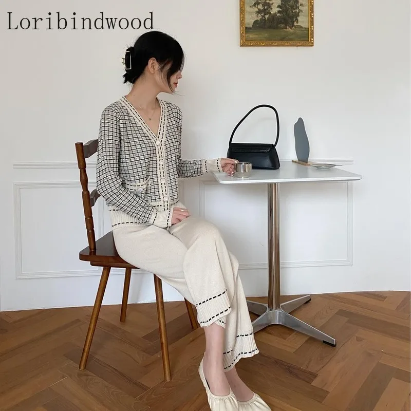 Autumn and Winter French Temperament V-neck Slim Slimming Long-sleeved Cardigan Sweater Top Female Two-piece Suit
Autumn and Winter French Temperament V-neck Slim Slimming Long-sleeved Cardigan Sweater Top Female Two-piece Suit