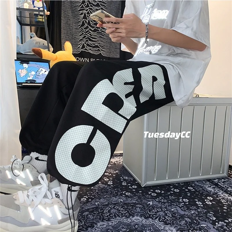 Autumn letter printed men's Leggings trend loose hip hop wide leg drawstring Sweatpants
Autumn letter printed men's Leggings trend loose hip hop wide leg drawstring Sweatpants